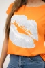 Blouse with lips print orange