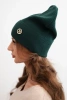 Women's ribbed cap made of modal and viscose with a decorative button dark green