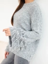 Women's sweater with fringes on the sleeves and a round neckline gray
