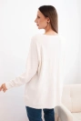 Damenpullover mit längerem Rücken und geprägtem Stern beige