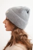 Women's winter fluffy hat with decorative button dark gray