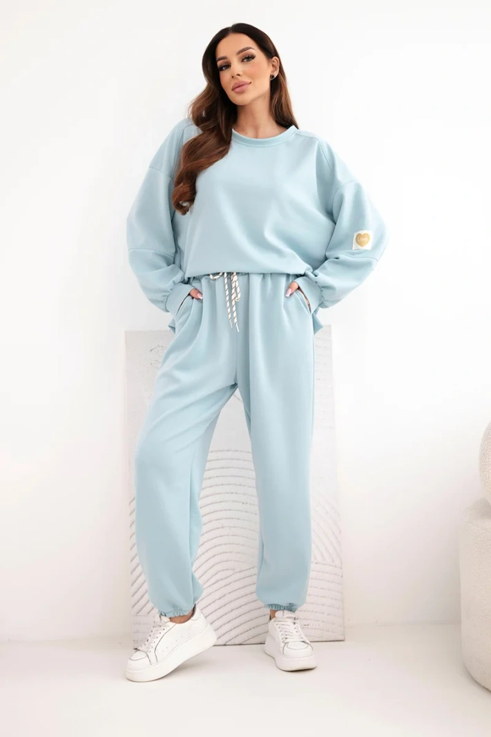 Women's buttery set with a loose sweatshirt and pants with the word LOVE dark mint