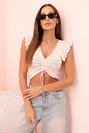 Women's ribbed blouse with gathering and ruffle powder pink