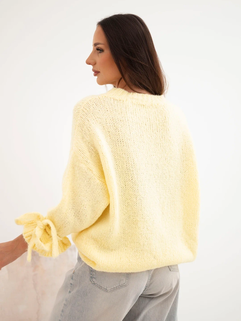 Women’s oversized sweater with ties at the sleeves yellow