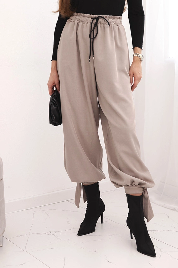 Women’s pants with wide legs and ties at the bottom fango