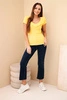 Women’s ribbed blouse with ruffle at the neckline yellow