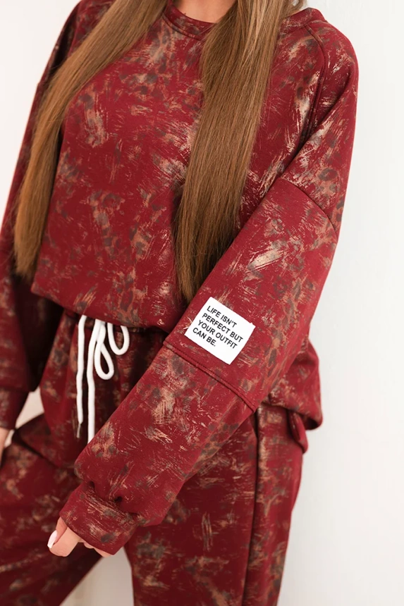 Women's oversized tracksuit set made of viscose with a longer sweatshirt and a faded effect burgundy