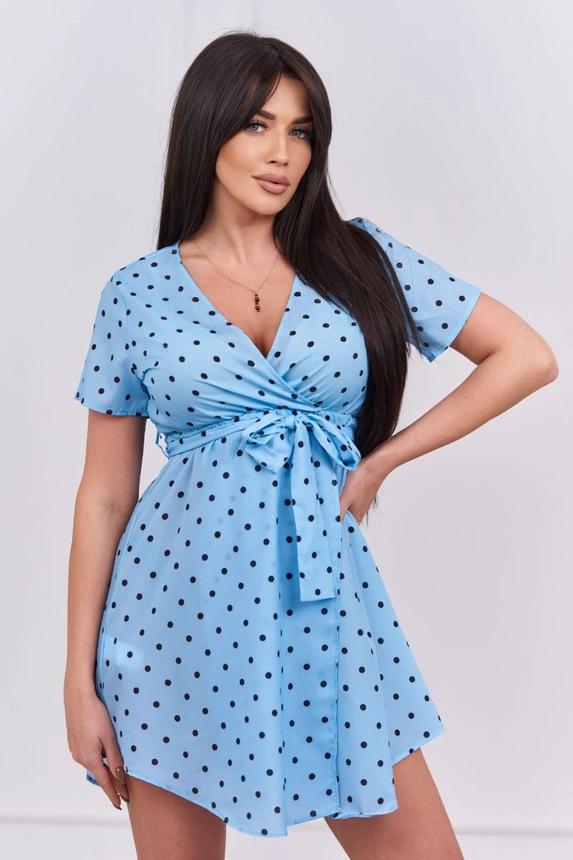 Blaues gepunktetes Kleid