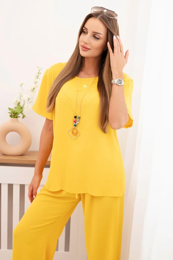 Women's set with a loose blouse and wide pants yellow