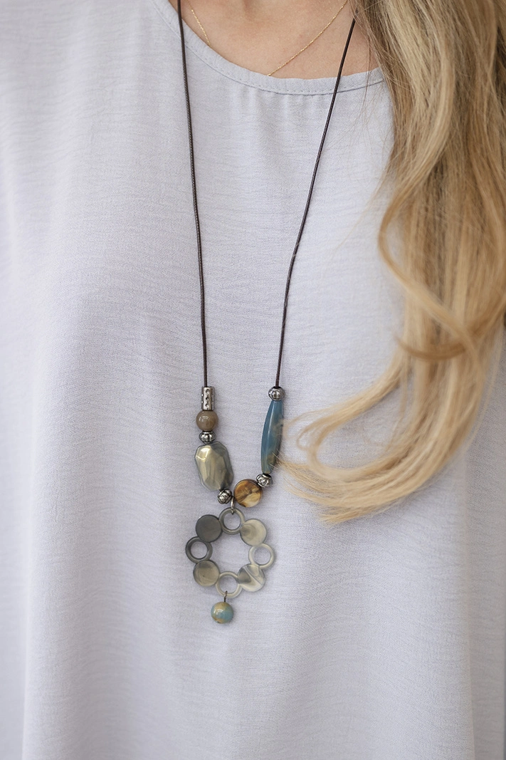 Oversized blouse with pendant grey