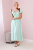 Ruffled dress with a tie at the neckline mint