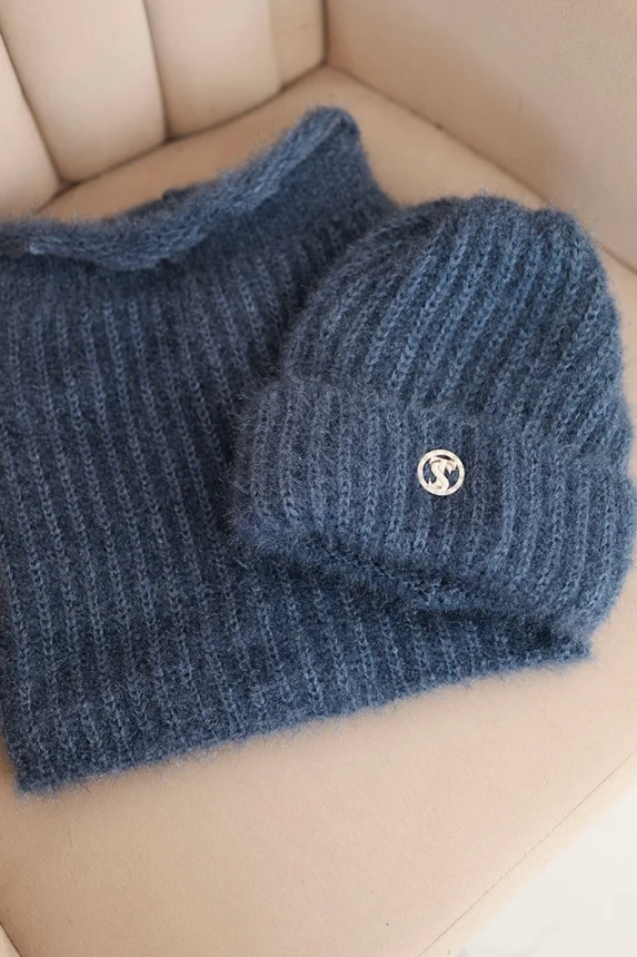 Women's set hat and winter fluffy scarf with decorative emblem denim color