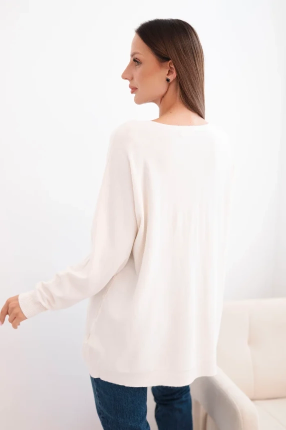 Damenpullover mit längerem Rücken und geprägtem Stern beige