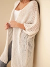 Women’s oversized sweater with a loose knit without fastening beige