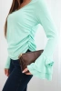 Women's ribbed blouse with a V-neck and ruffles on the sleeves mint