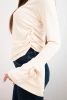 Women's ribbed blouse with a V-neck and ruffles on the sleeves beige