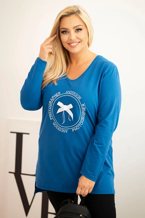 Women's blouse with a longer back and print cornflower blue