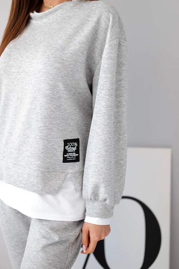 Women's set with a loose sweatshirt and sweatpants butter gray mélange