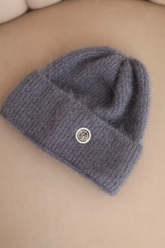 Women's winter fluffy hat with decorative button graphite