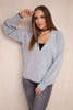 Buttoned sweater with a decorative weave gray