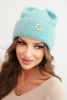 Women's winter fluffy hat with a decorative button mint