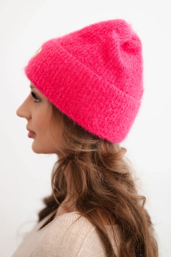 Damenwintermütze flauschig mit dekorativem Knopf neonrosa
