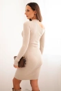 Women's knitted dress with long sleeves and an asymmetrical neckline beige