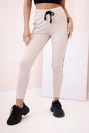 Women's sweatpants with side stripes and drawstring waist beige