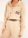 Women's set made of viscose corduroy with a jacket and trousers with a belt beige