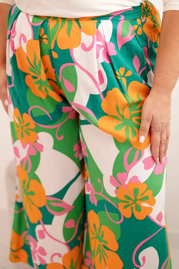 Dámske nohavice Plus Size z viskózy s kvetinovým vzorom oranžová