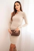 Women's knitted dress with long sleeves and an asymmetrical neckline beige