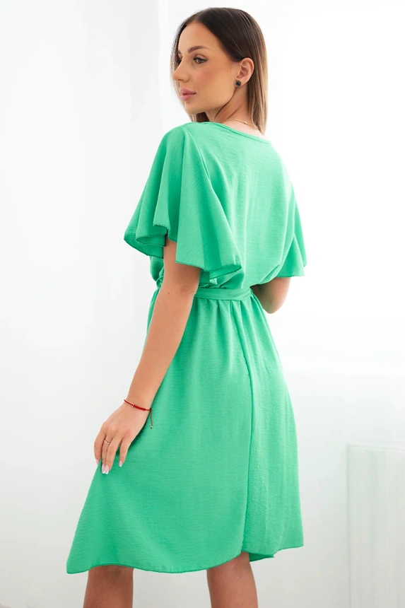 Dress with a wrap neckline light green