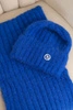 Women's set hat and long scarf made of soft yarn cornflower blue