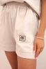 Women's punto set with short sleeves and loose shorts beige
