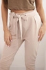 Women's cotton pants with a tie at the waist and tapered legs beige