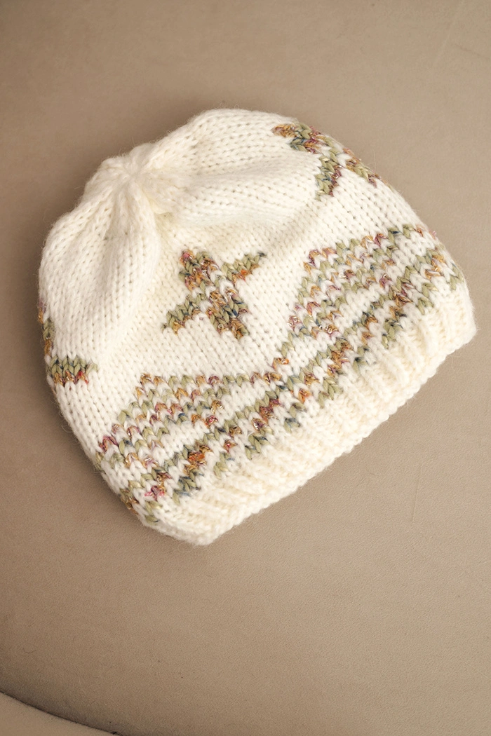 Women's winter hat made of wool with a colorful pattern K478 ecru