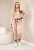 Velour set with a decorative brooch dark beige