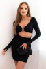 Women's dress with long sleeves and a cut-out at the waist with a decorative circle black
