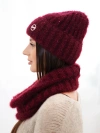 A set women's hat and snood made of knitwear burgundy
