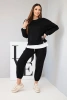 Damen-Set mit einem lockeren Sweatshirt und Jogginghosen schwarz