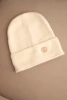 Women's soft alpaca hat with decorative plate beige