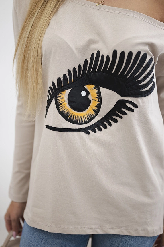 Blouse with a print and longer back beige