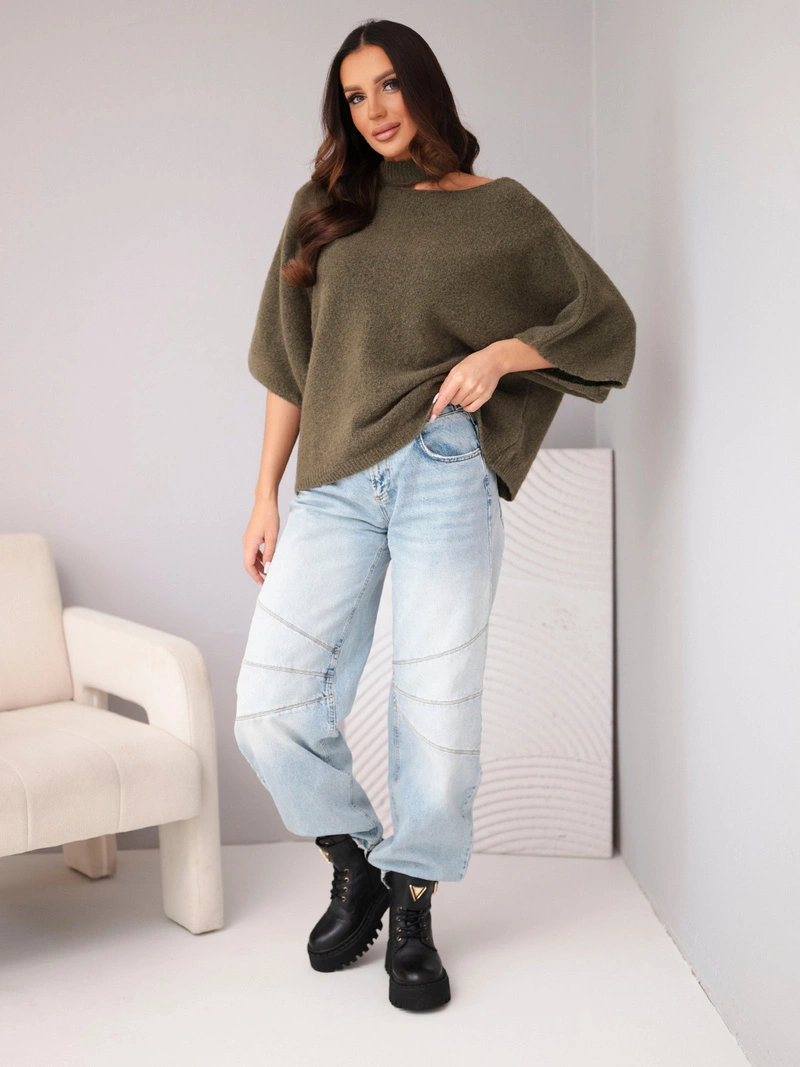 A sweater women's oversize with asymmetric neckline and turtleneck khaki