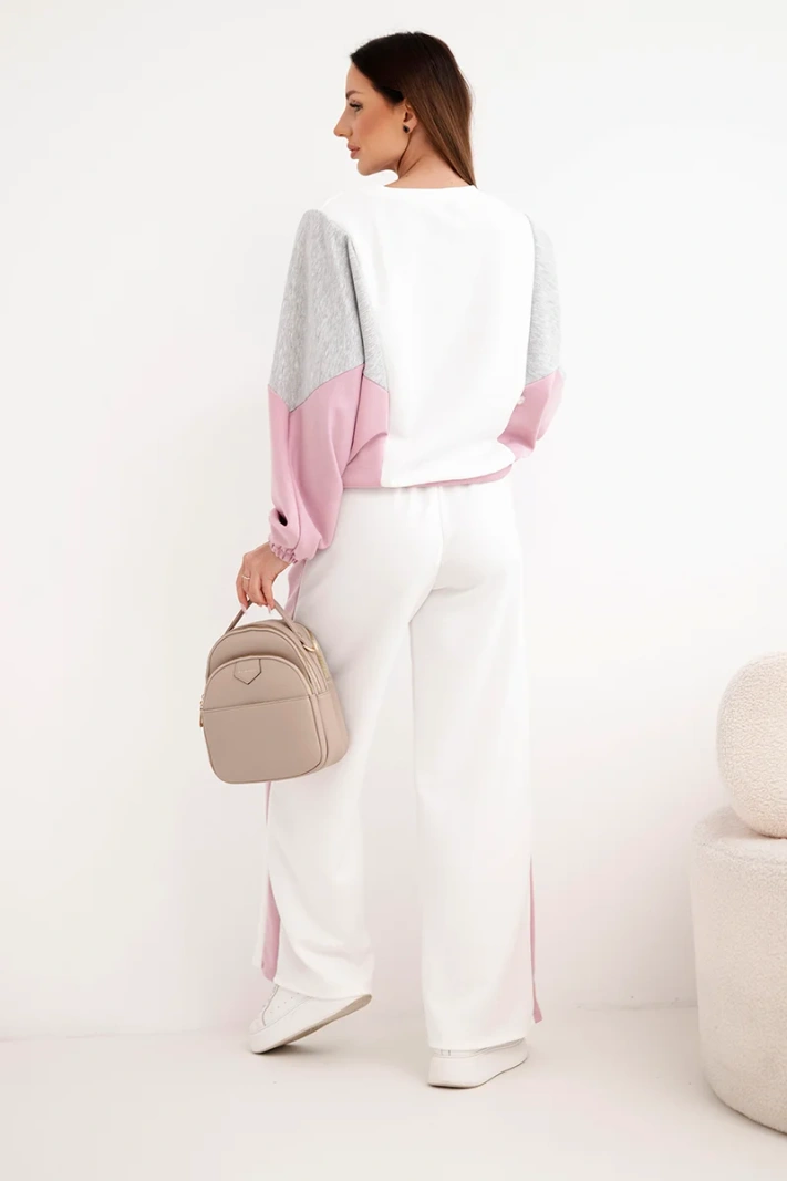 Damenanzug Butter mit lockerer Bluse und weiten Hosen dunkelrosa
