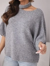 A sweater women's oversize with asymmetric neckline and turtleneck gray