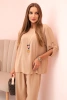 Women's set with a blouse with a necklace and wide pants camel