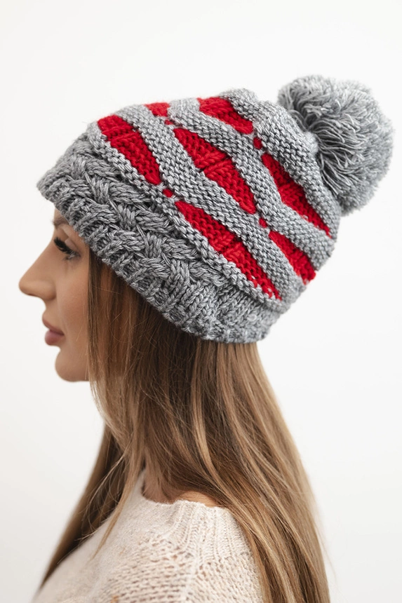 Women's winter knitted hat with pompom and cable knit pattern K466 gray
