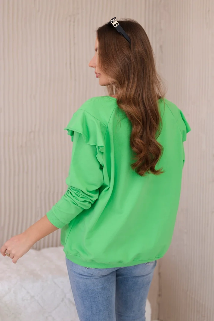 Cotton blouse with frills on the shoulders bright green