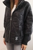 Women's quilted jacket with a short cut and a stand-up collar black