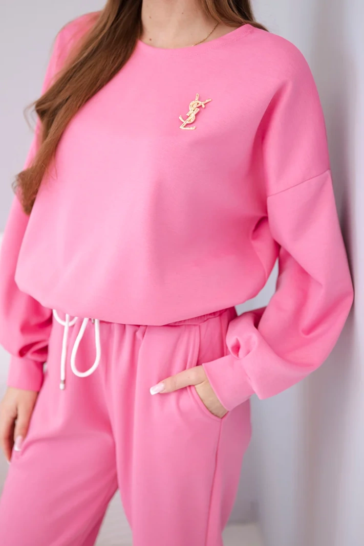 Women's set butter sweatshirt with a brooch and straight leg trousers pink